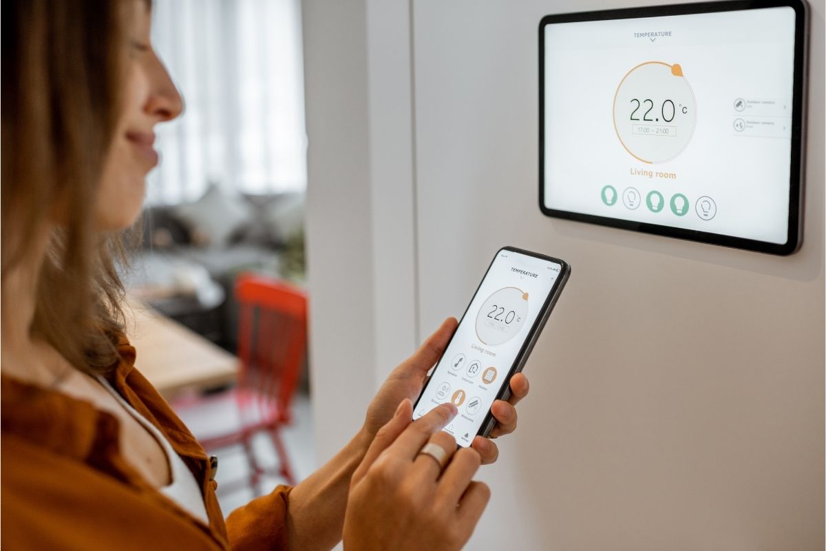 Installation of a smart Nest thermostat integrated with a multi-zone HVAC system.